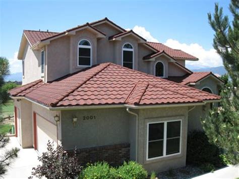 image house metal coated roof spanish style|mediterranean metal roof exterior.